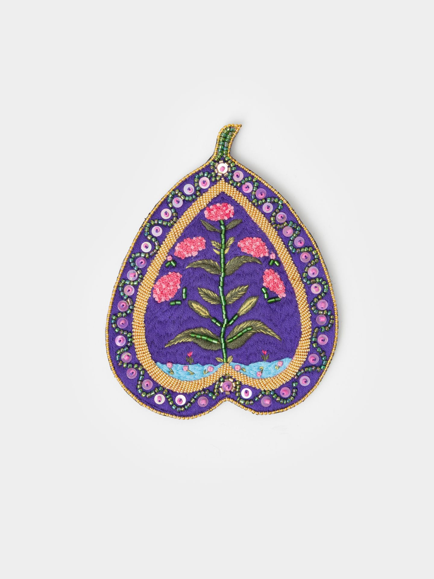 گل سینه برگ بنفش